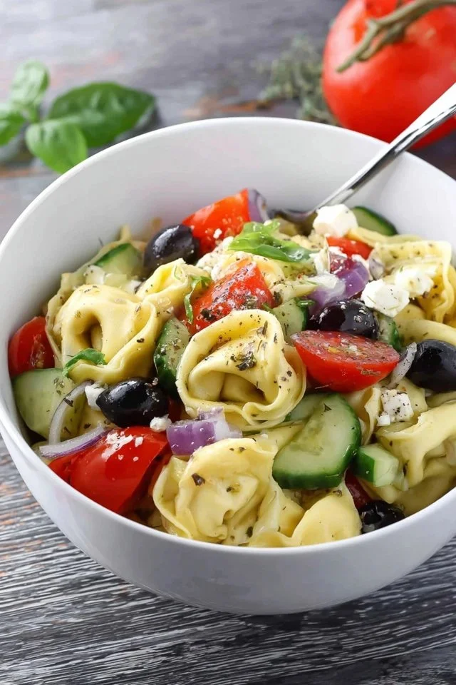 Delicious Greek Tortellini Pasta Salad with fresh vegetables and dressing