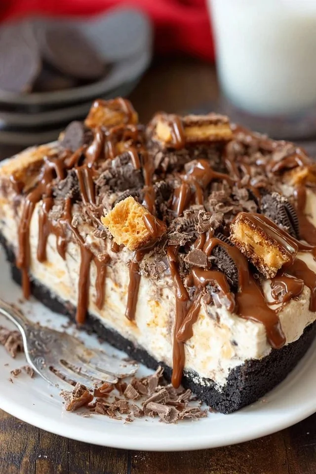 No-Bake Butterfinger Pie with chocolate and peanut butter toppings